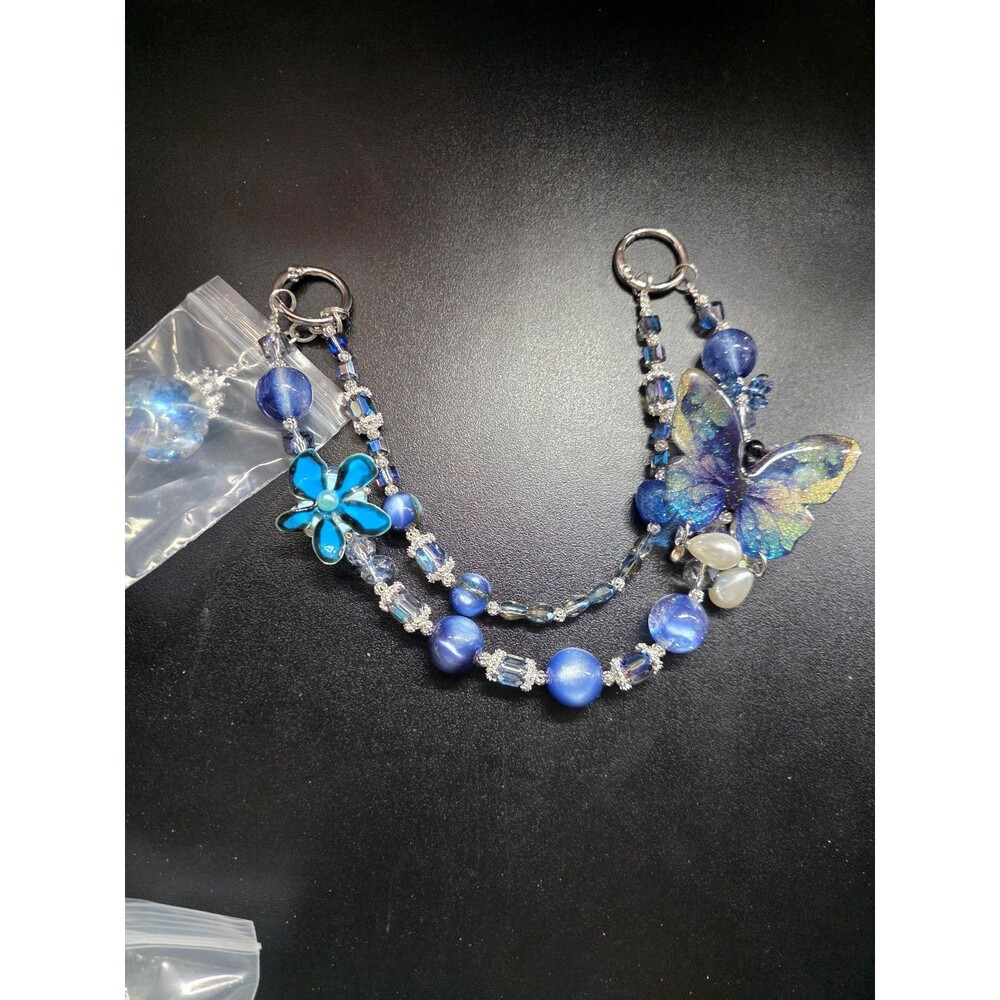 Blue Butterfly bag chain.